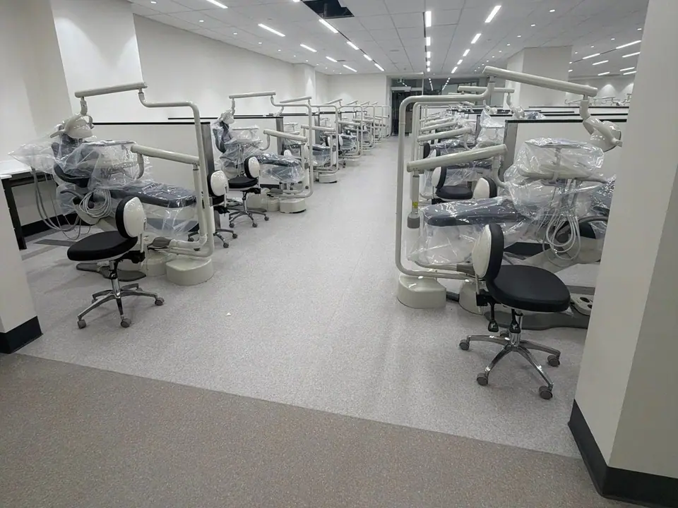 Dental clinic operatories with protected chairs during a medical deep clean