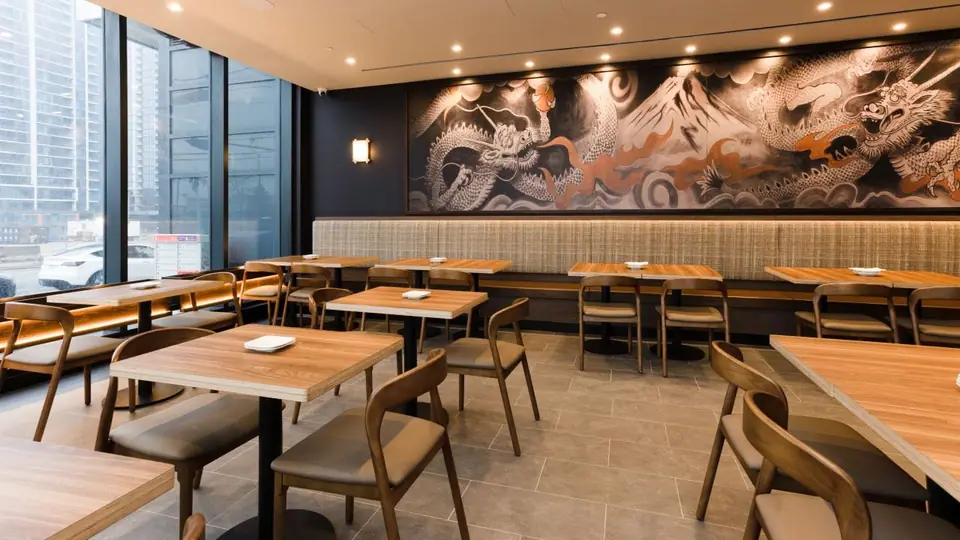 Restaurant dining room with floor-to-ceiling windows after a turnover clean