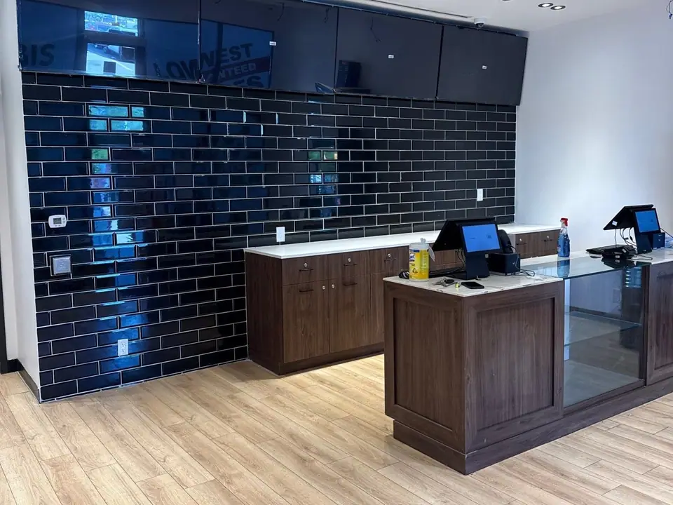 Retail store counter and tile wall after a post-construction clean